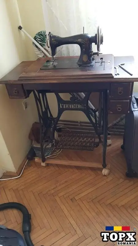 Mașină de cusut