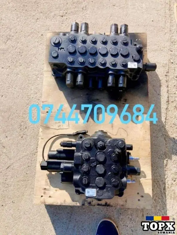 Distribuitor  chiuloasa si pompa hidraulica pentru JCB