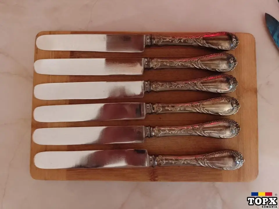 6 cutite cu maner placat cu argint.